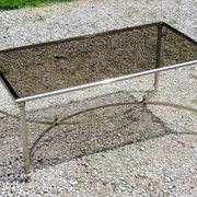 Chrome metal coffee table with smoked glass top in neoclassical style, 1970s.