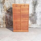 Double curtain binder cabinet