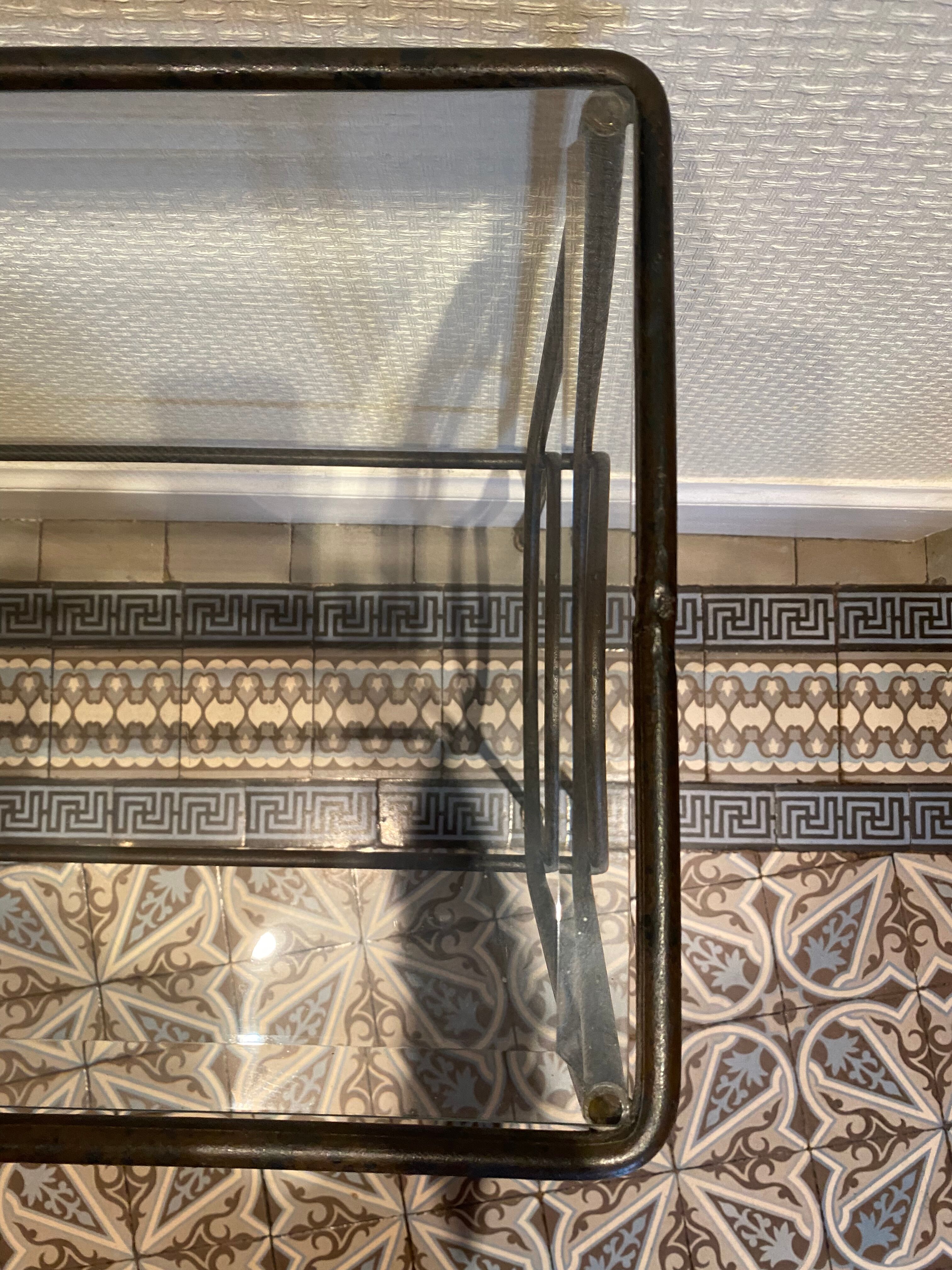 Green console and wrought iron