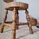 Tripod stool "Bobbin" style, turned wood and straw.