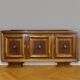 According to Charles Dudouyt: sideboard in a row from the Art Deco period in solid wood.