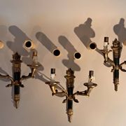 Set of 3 Empire style wall lights in bronze and gilded and green lacquered brass, Circa 1950.