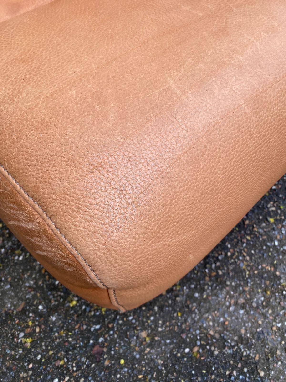 Scandinavian pouf design in brown leather, made in Switzerland by De Sede.