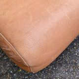 Scandinavian pouf design in brown leather, made in Switzerland by De Sede.