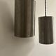 Pair of vintage brushed metal pendant lamps, France 1960