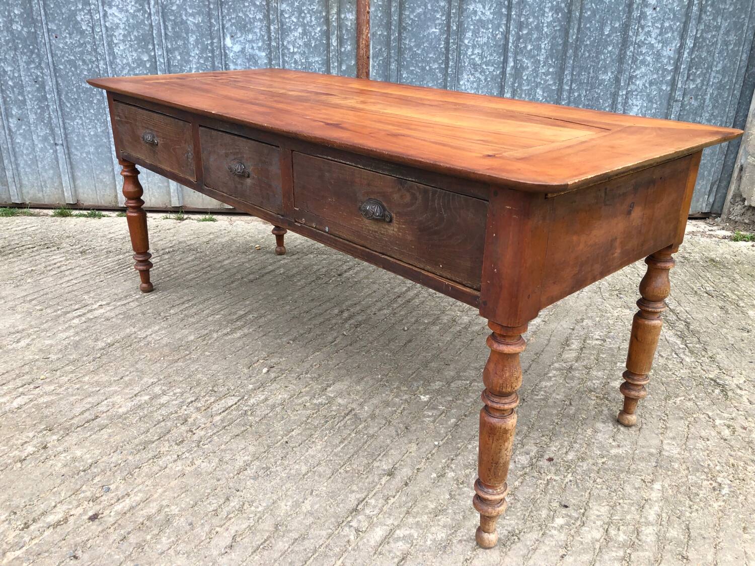 Antique Louis Philippe table in solid cherry and oak with 3 drawers