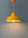Small vintage yellow industrial pendant light