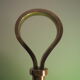 Desk lamp in brass with a swan neck and green opaline glass.