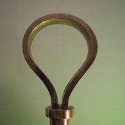 Desk lamp in brass with a swan neck and green opaline glass.