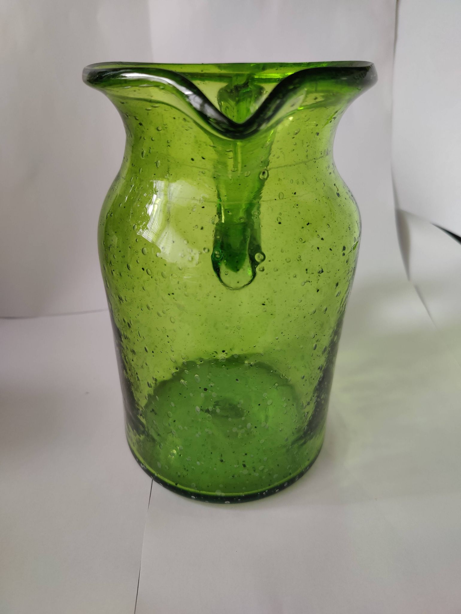 Bubble glass pitcher in the style of Biot or Empoli.