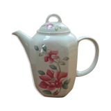 Vintage porcelain coffee or teapot with milk jug