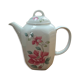 Vintage porcelain coffee or teapot with milk jug