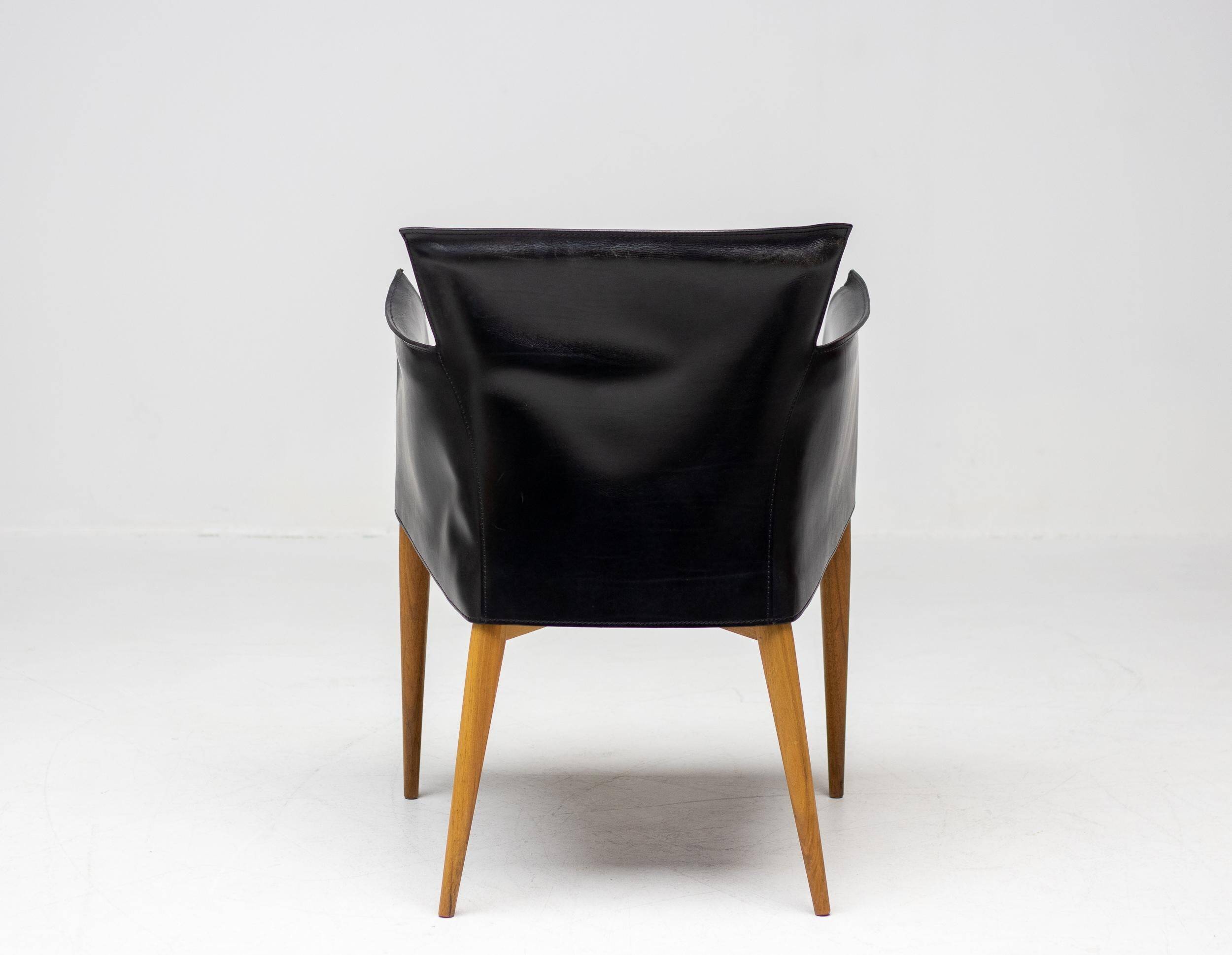 Set of four Vela leather armchairs by Carlo Bartoli - Italian modern elegance.