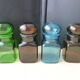 Set of 4 jars or bottles in colored glass Ariel 70s