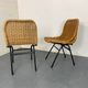 Set of 2 mid-century modernist wicker and black steel dining chairs, 1950s