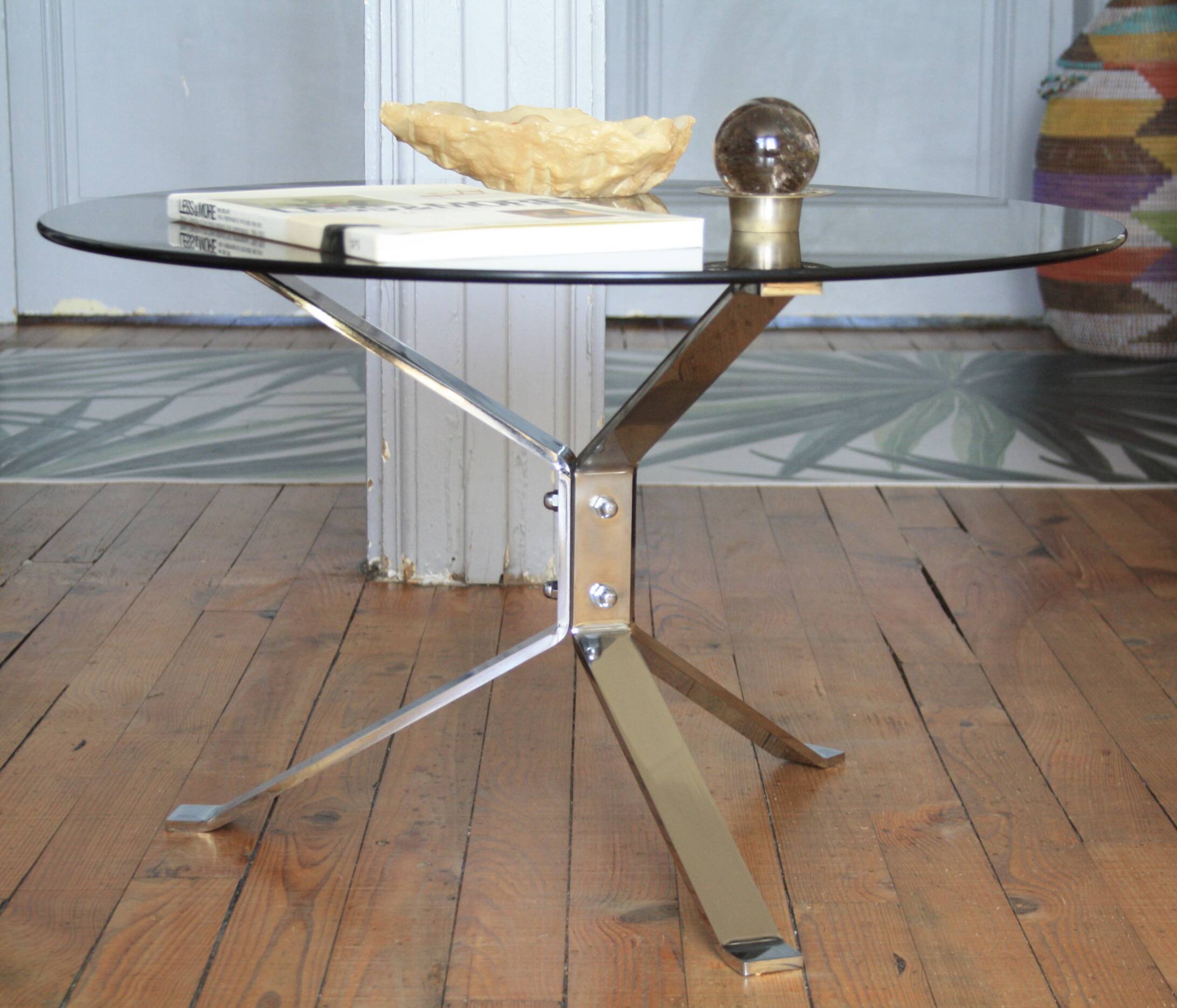 Round coffee table in smoked glass and chrome