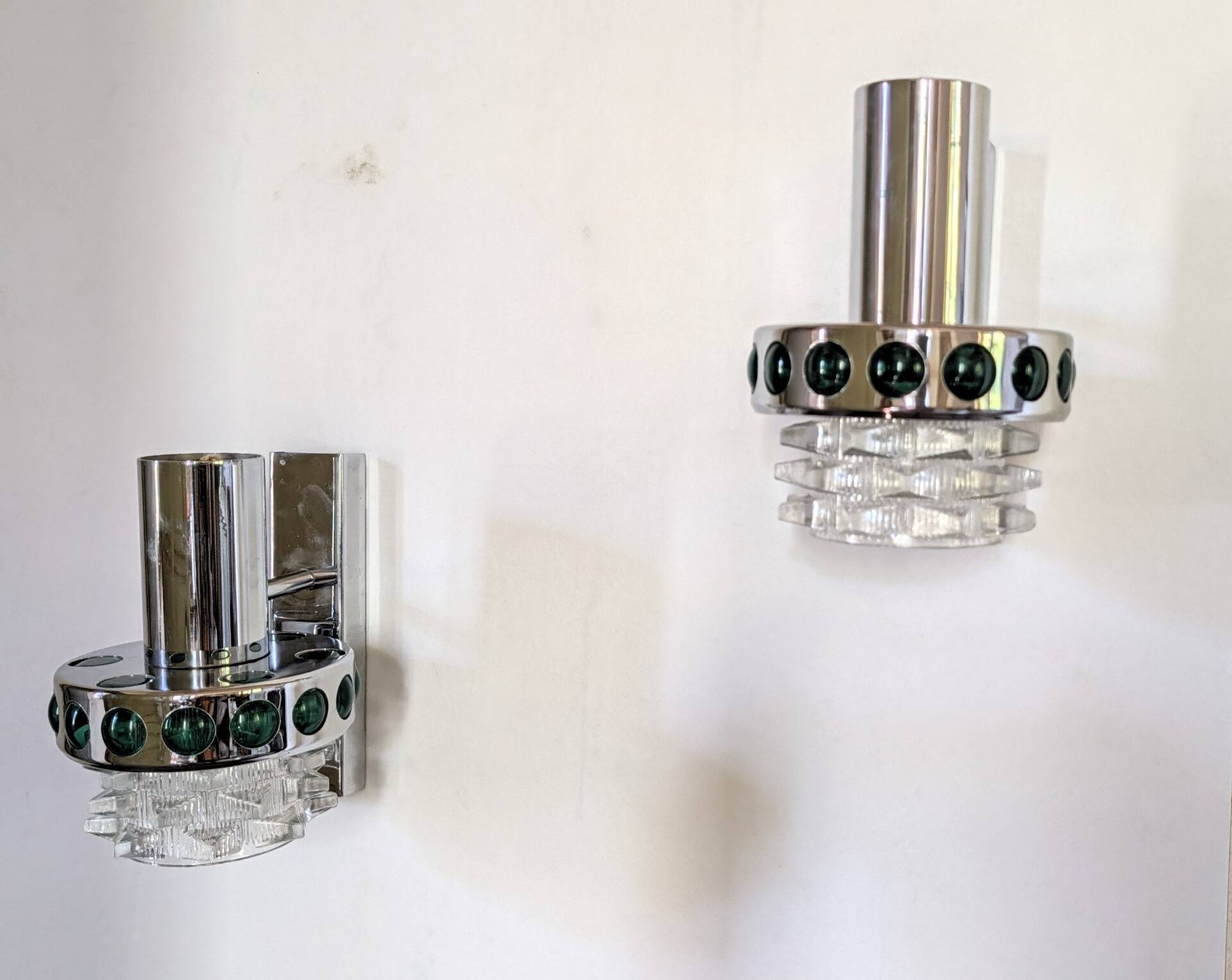 Pair of Space Age wall lights in chrome and green glass, 1970s.