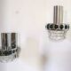 Pair of Space Age wall lights in chrome and green glass, 1970s.