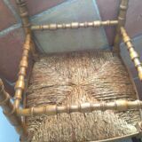 Turned wooden fire corner armchair, mulched seat