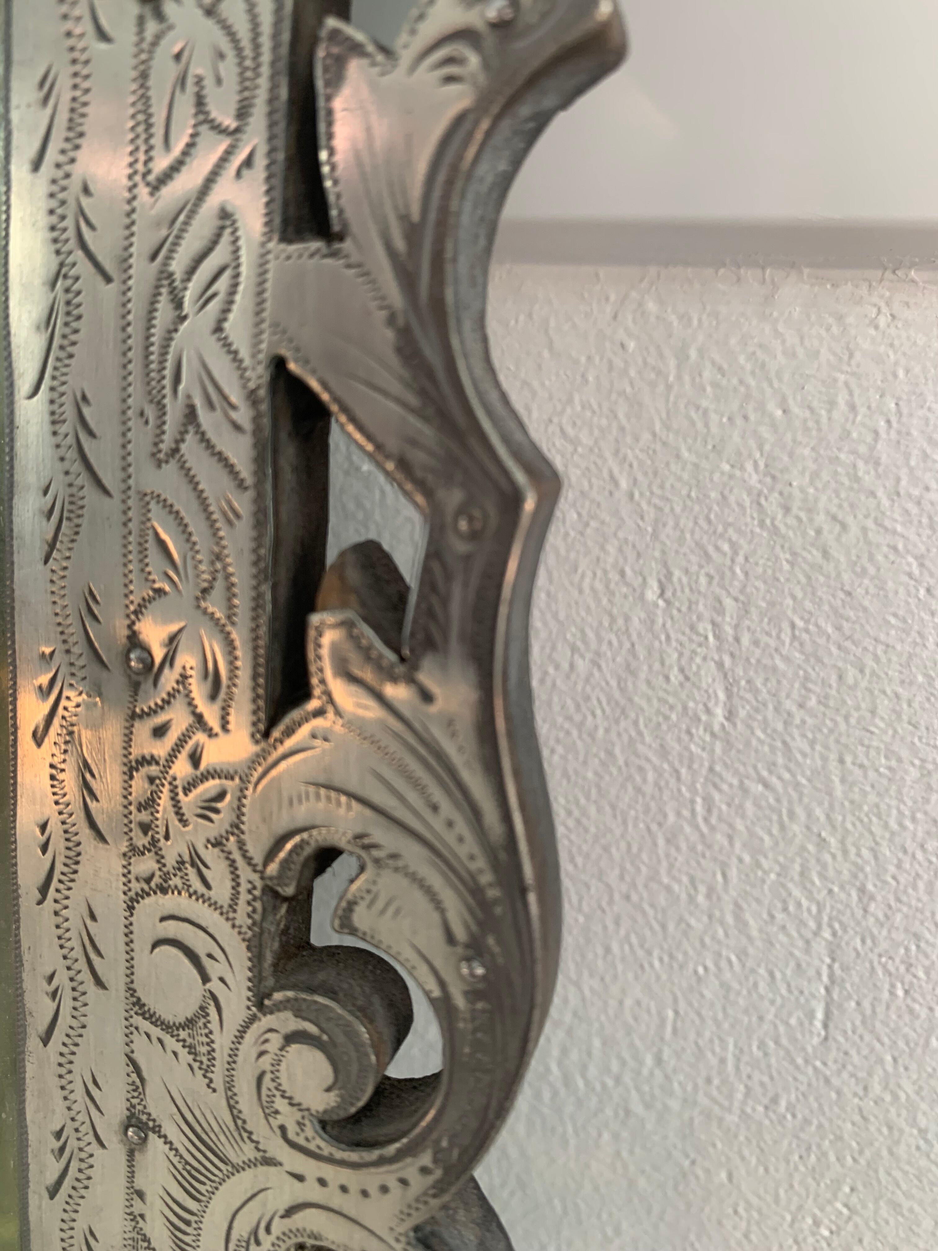 Eventful beveled mirror and openwork period 1900 repelled tin decoration