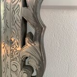 Eventful beveled mirror and openwork period 1900 repelled tin decoration