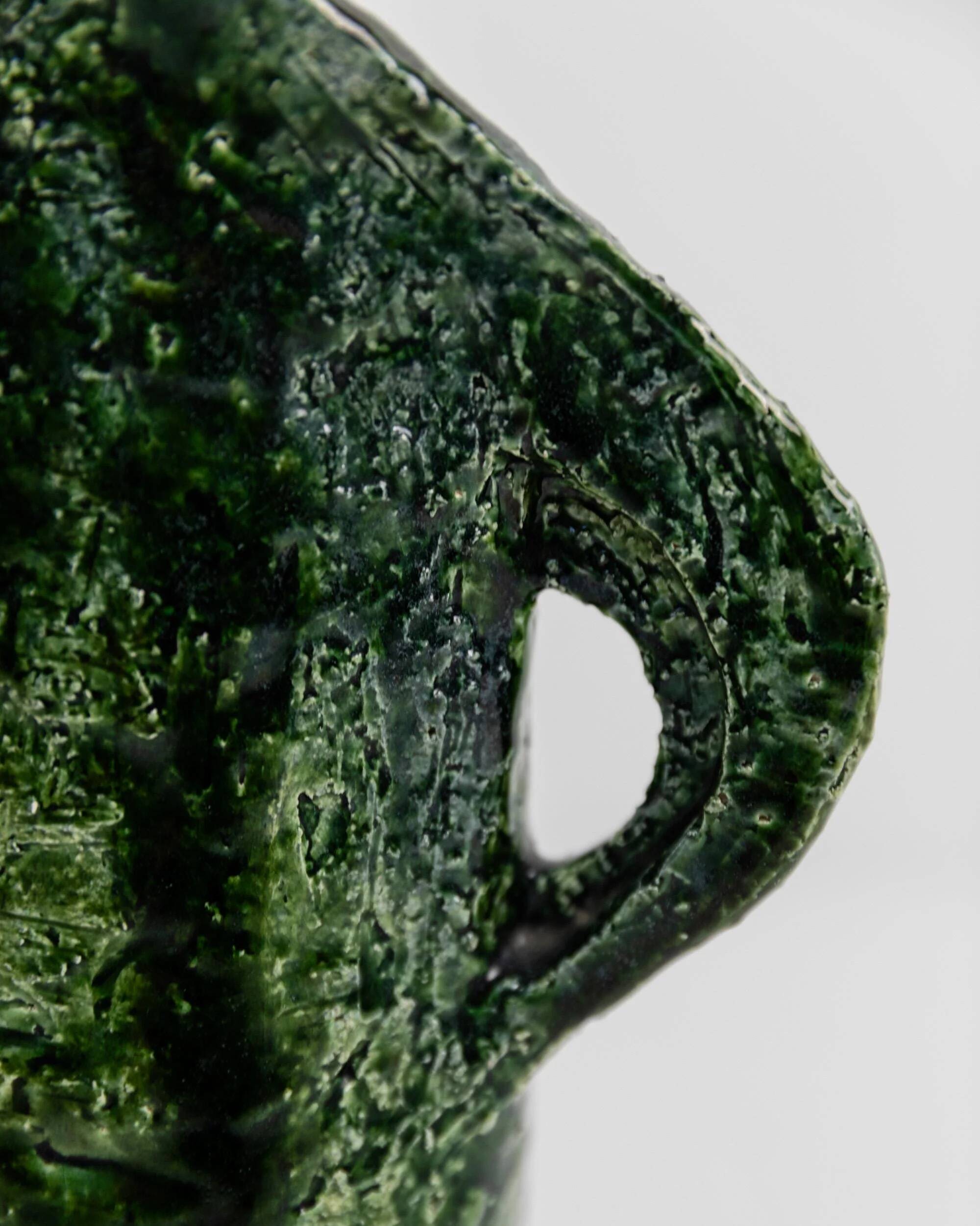 Vintage 1970s studio ceramic vase or pitcher, glazed green.