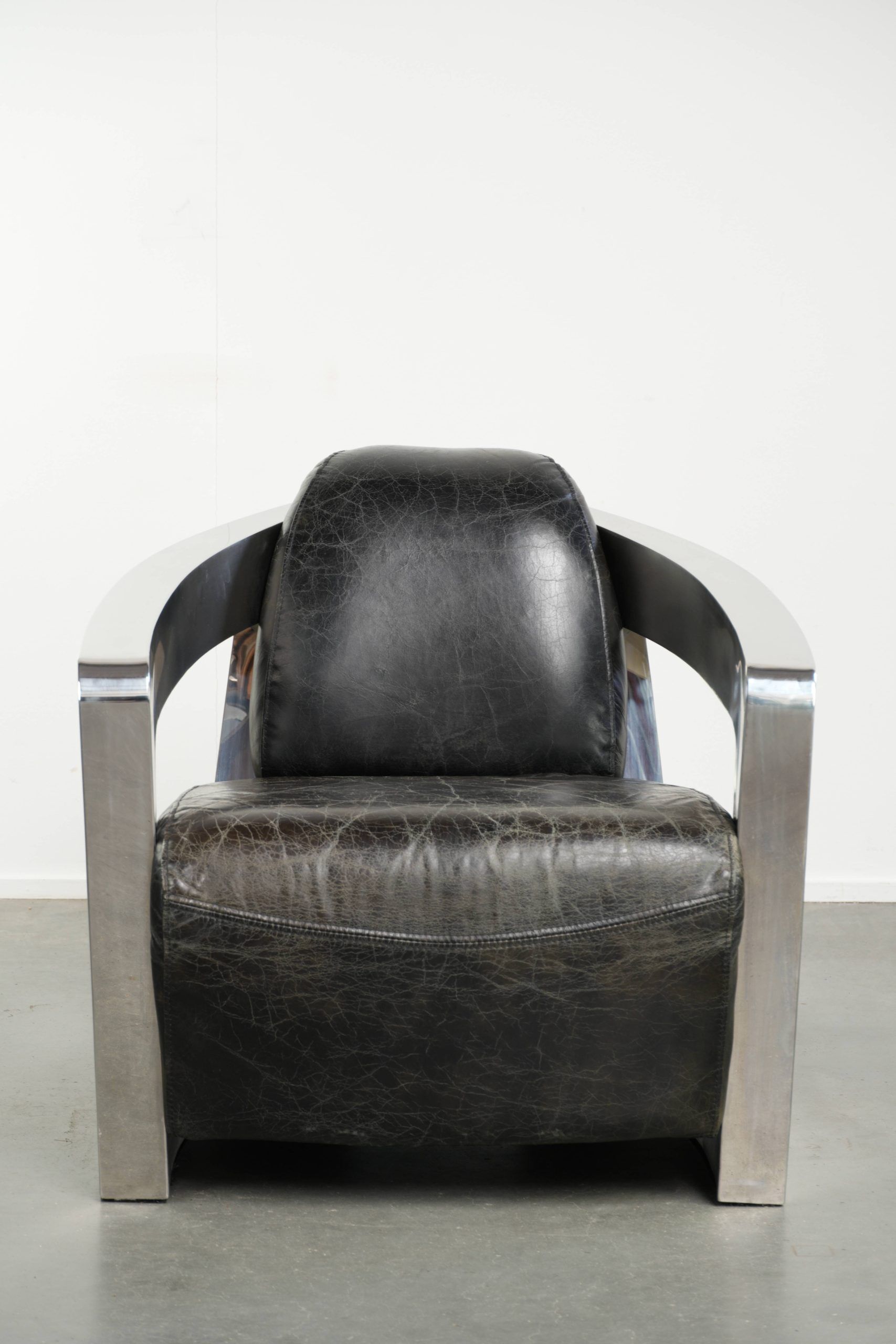 Vintage aviator design armchair in cowhide leather with aluminium