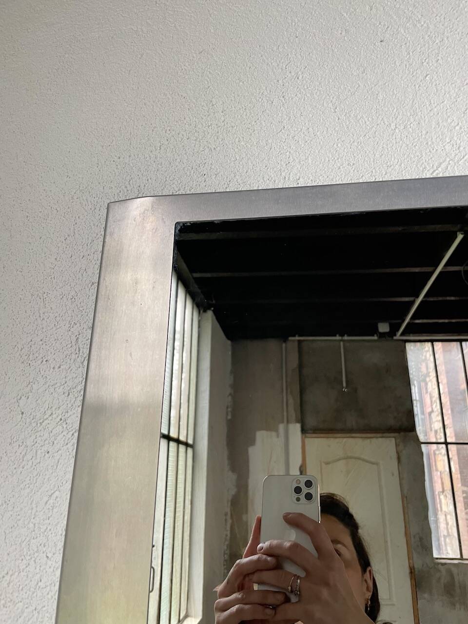 Brushed stainless steel mirror circa François Monnet and Joelle Ferlande