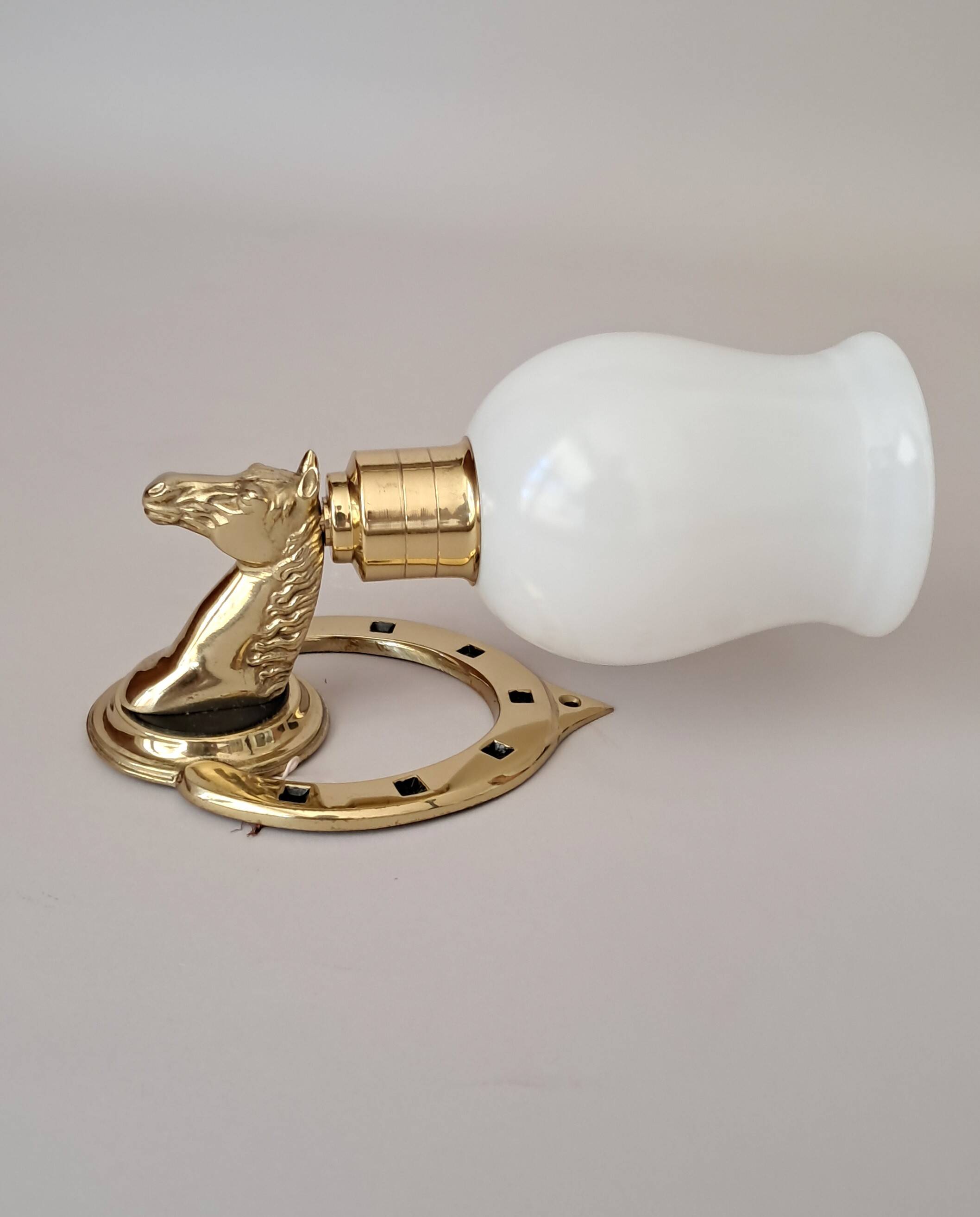 Gilded bronze wall lamp with iron and horse head 1950/1960.