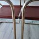 B34 armchairs, cognac leather and gilding