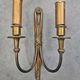 Pair of Louis XVI style bronze wall sconces with bow and tassel, 1940s.
