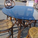 Rattan dining table and its 4 matching chairs
