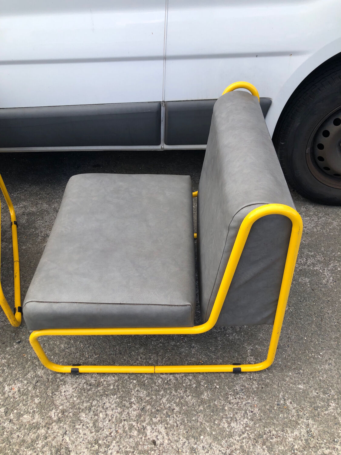 Pair of designer armchairs by Henri Julien