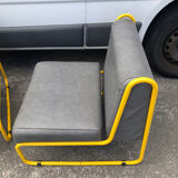 Pair of designer armchairs by Henri Julien