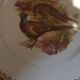 Lot de 24 assiettes plates scènes de gibiers