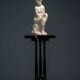 Black lacquered pedestal with brass details, 20th century