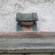 Old wooden door with pulley