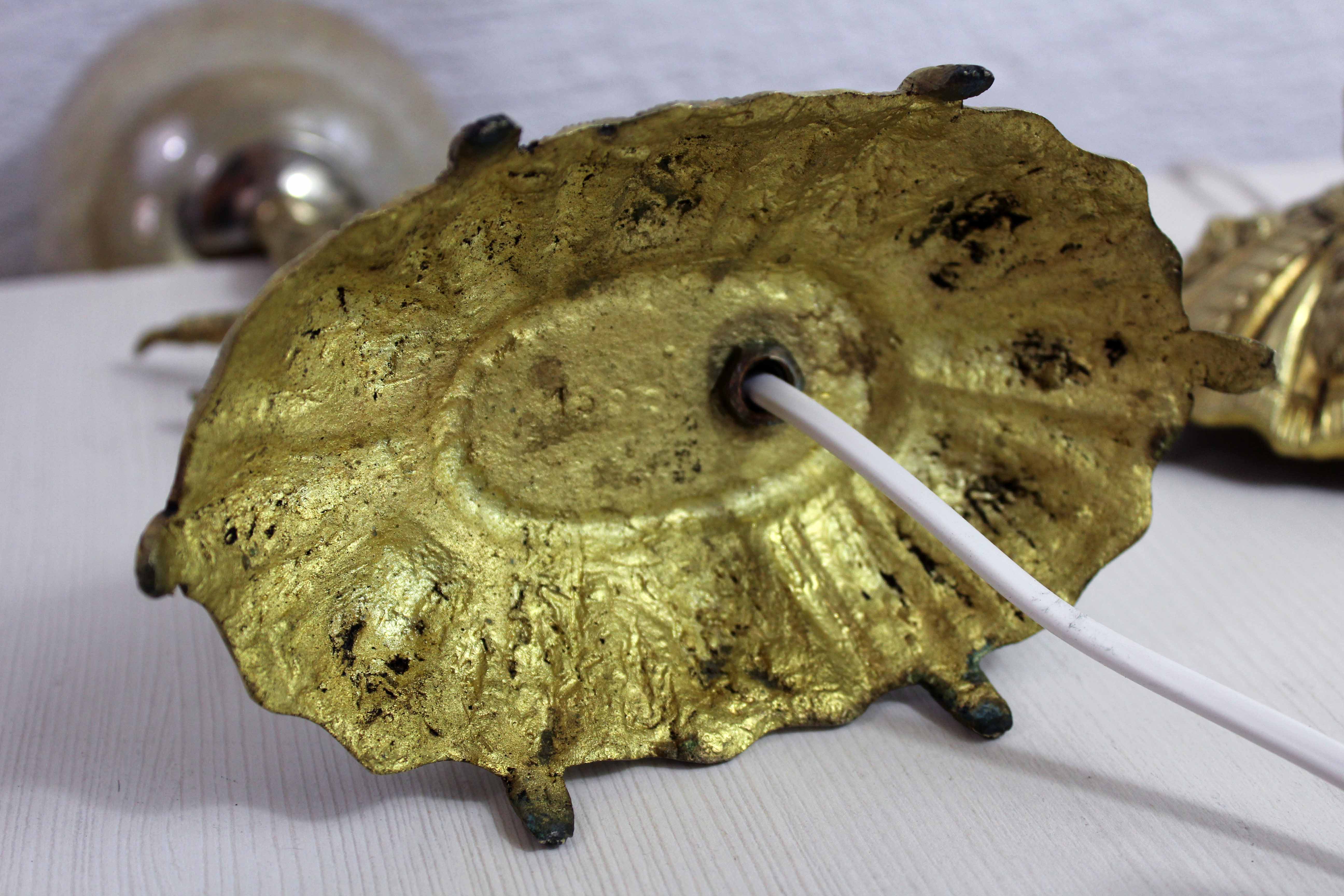 Pair of lamps in bronze and gilded glass