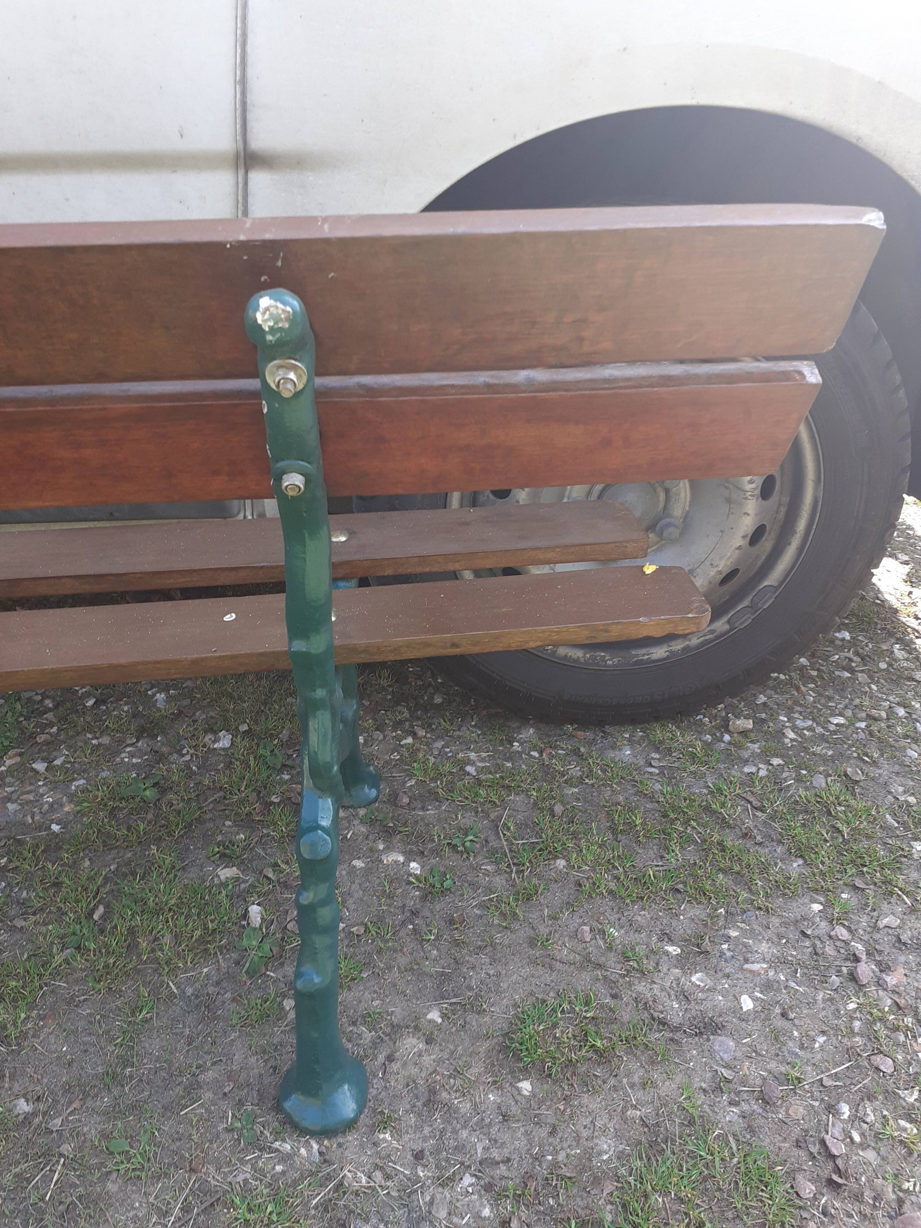 Old garden bench with cast iron feet