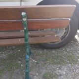 Old garden bench with cast iron feet