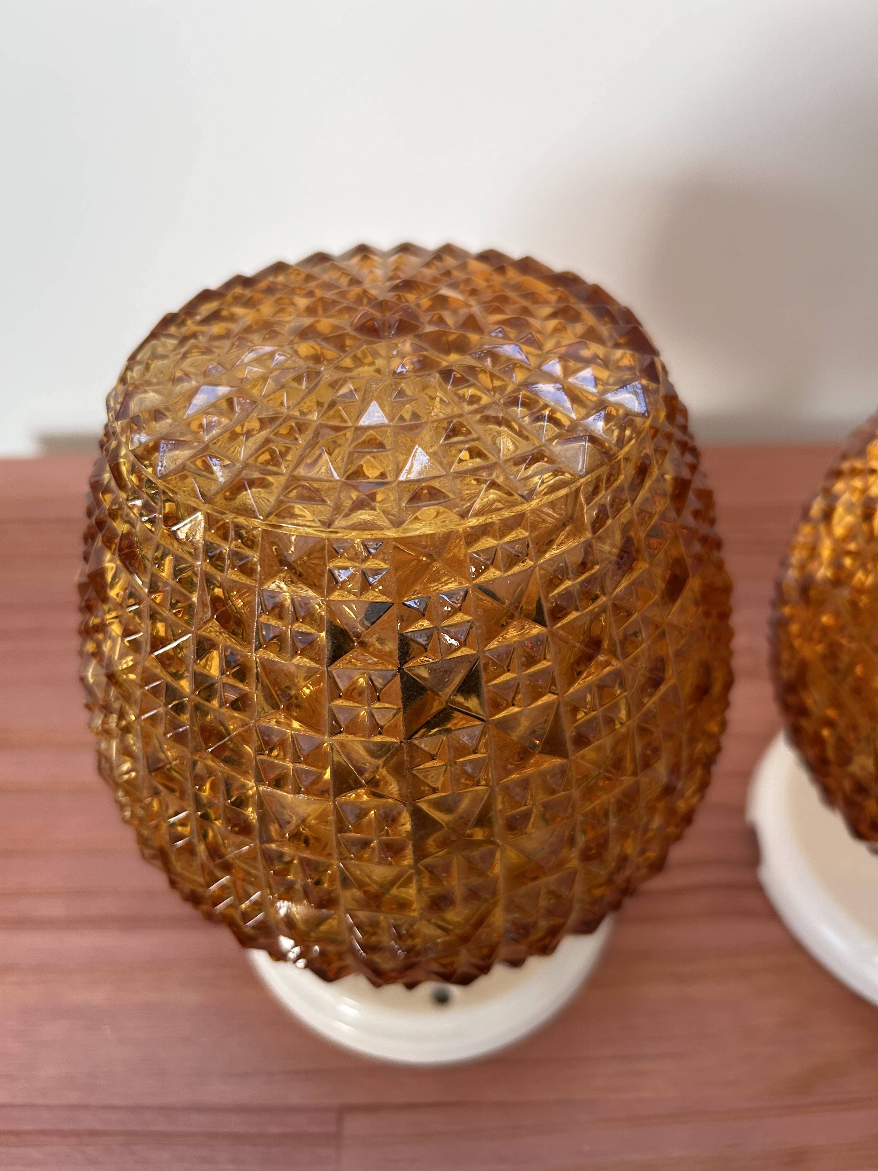 Pair of gold glass wall sconces