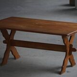 Solid oak dining table with cross base by Danish cabinetmaker, mid-20th century.