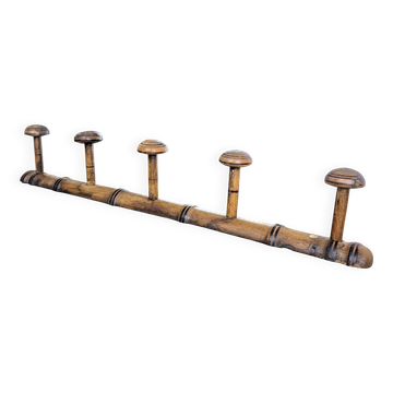 Turned wooden coat rack