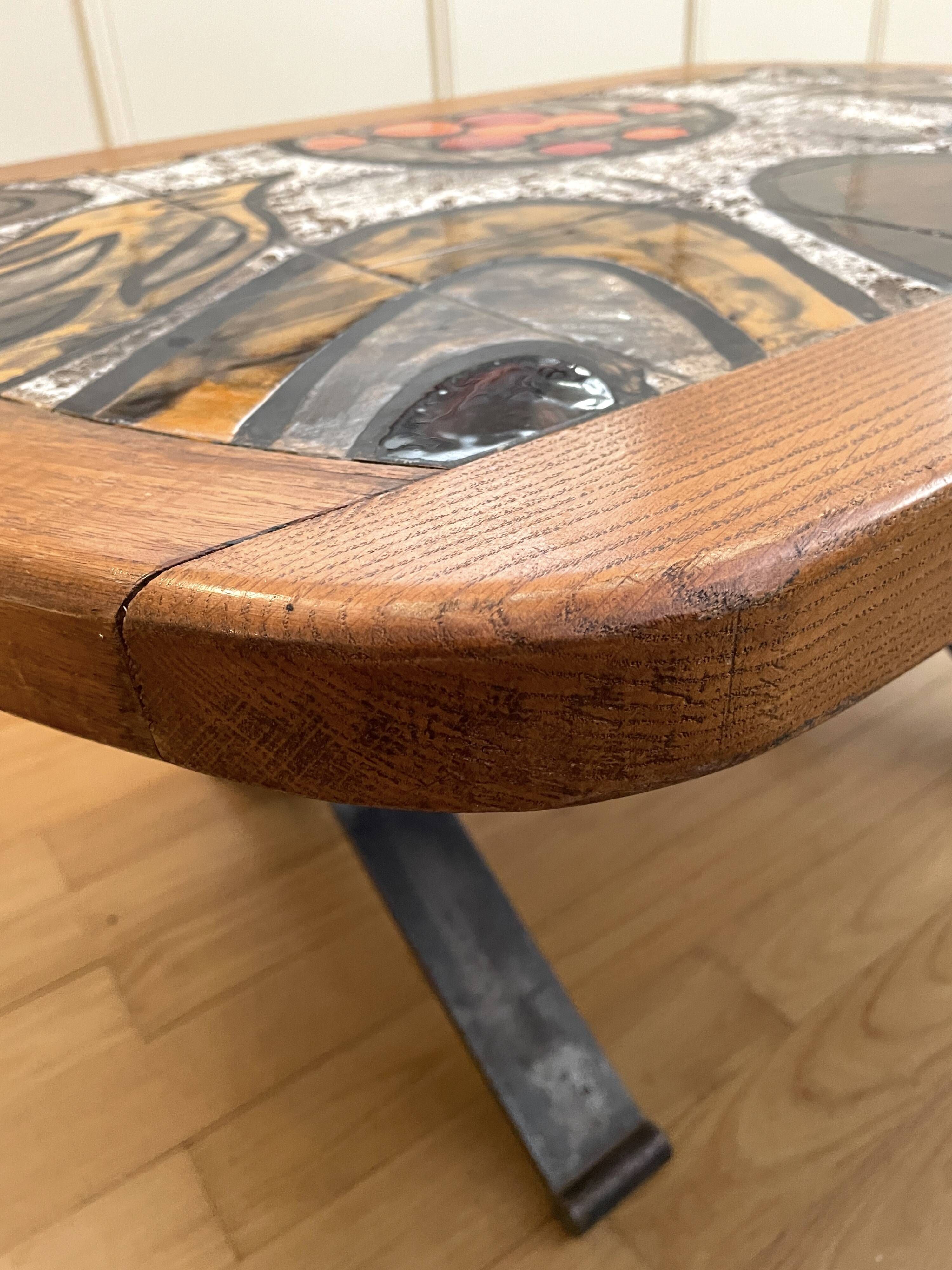 Ceramic coffee table with metal base by G. Reynaud Vallauris