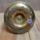 Antique brass candlestick with pusher