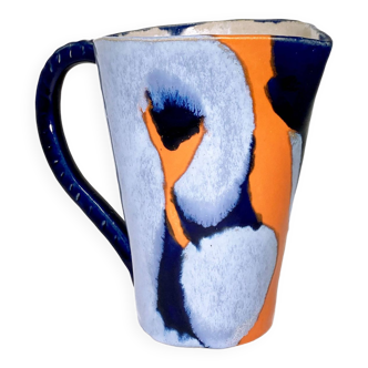 Blue and orange pitcher