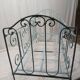 Old children's bed with metal bars