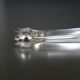 Art Deco-style silver metal sugar pinch 1930