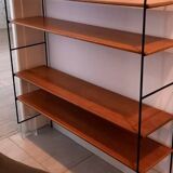 Vintage metal and solid wood string style wall shelf.