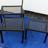 Black nesting tables by Pierre Vandel